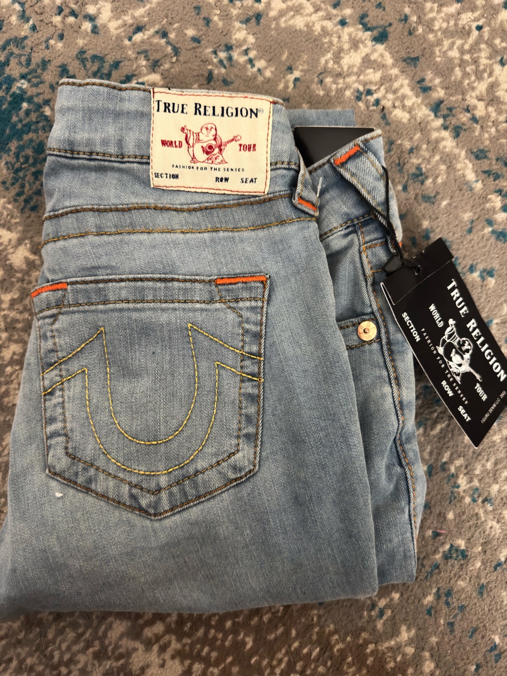 True Religion Men's Light Blue Slim Jeans with Yellow Stitching